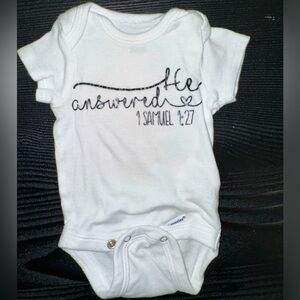 “He Answered” Newborn Onesie